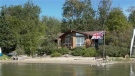 A cabin at Christopher Lake, listed June 21, 2017, at $487,000 on point2homes.com, is shown here. (point2homes.com)