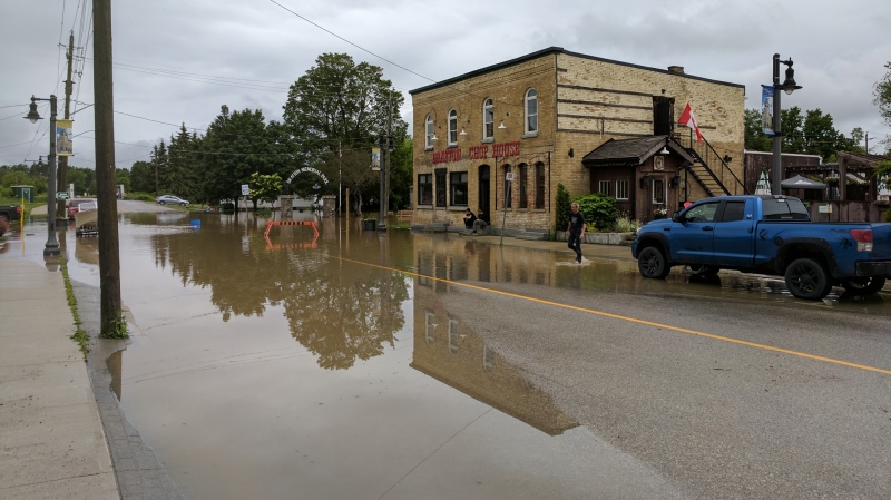 Water covers a road in Drayton on Friday, June 23, 2017. (Marta Czurylowicz / CTV Kitchener)