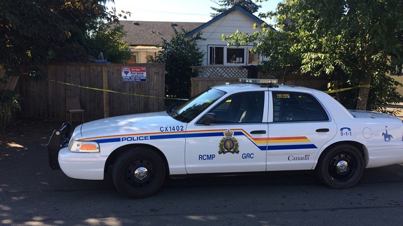 A Courtenay home remains behind police tape and a man has been arrested after a 25-year-old man was found dead Friday. June 30, 2017. (CTV Vancouver Island)