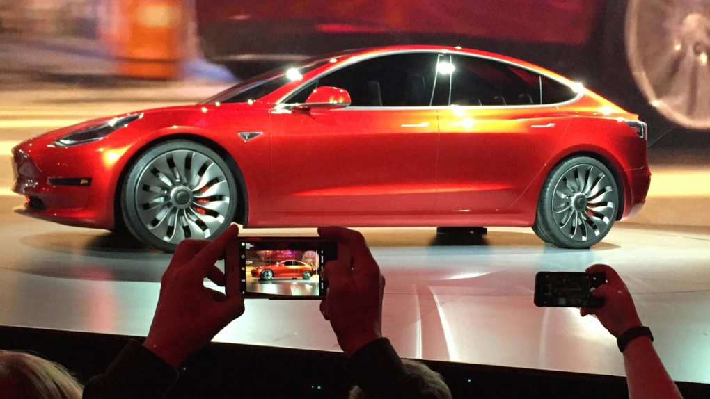 Tesla unveils the Model 3 sedan in 2016
