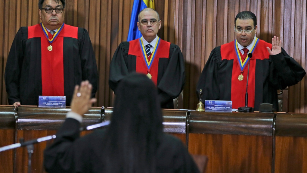 Katherine Harrington swears an oath in Caracas