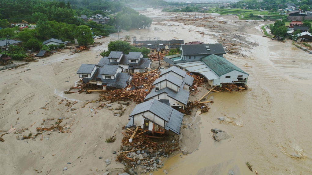 Flood waters damage houses in Japan