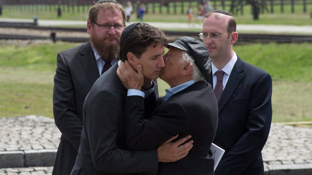 Trudeau at Auschwitz with Rabbi Adam Scheier