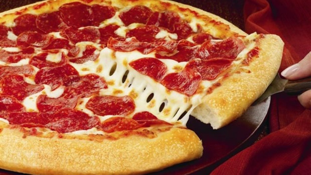 It turns out 'delivered in less than 30 minutes or your pizza is free' is not written in law in Ontario. (File photo)