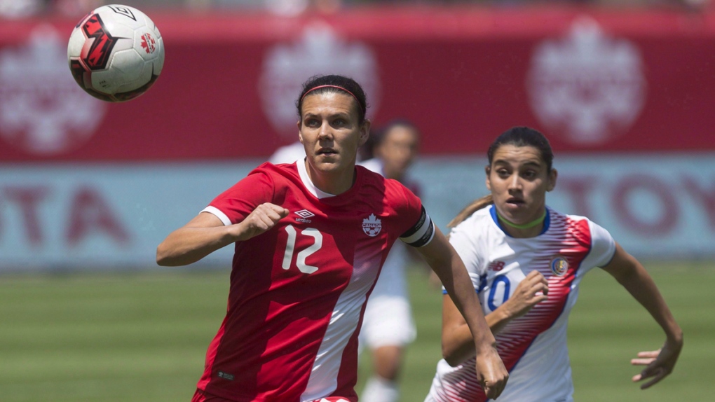 Christine Sinclair, left, playing in Toronto