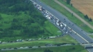 Cars were backed up for several hours on Highway 400 after a chemical spill prompted lengthy road closures. 