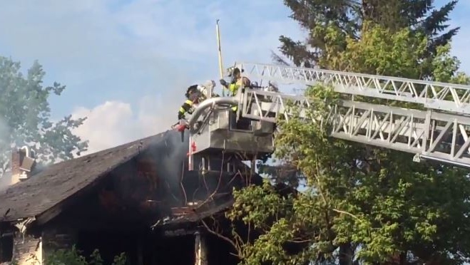 Firefighters battle blaze in vacant home