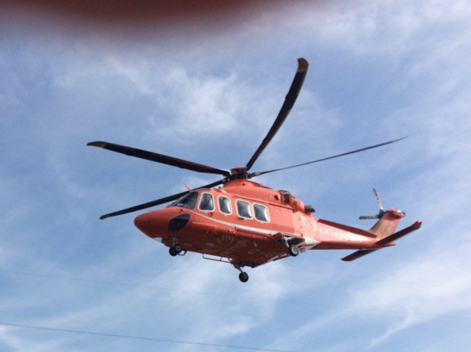 An air ambulance leaves the scene of 401 crash
