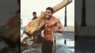 Ross Edgley is shown carrying a log in this image posted to his Instagram page on June 5, 2017.
