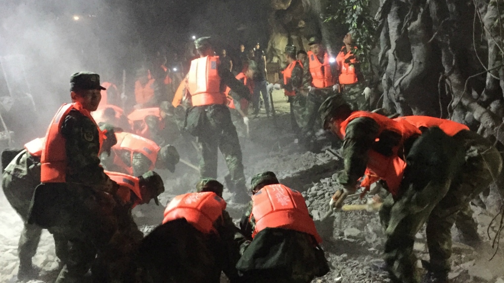 Rescuers search for bodies after China quake