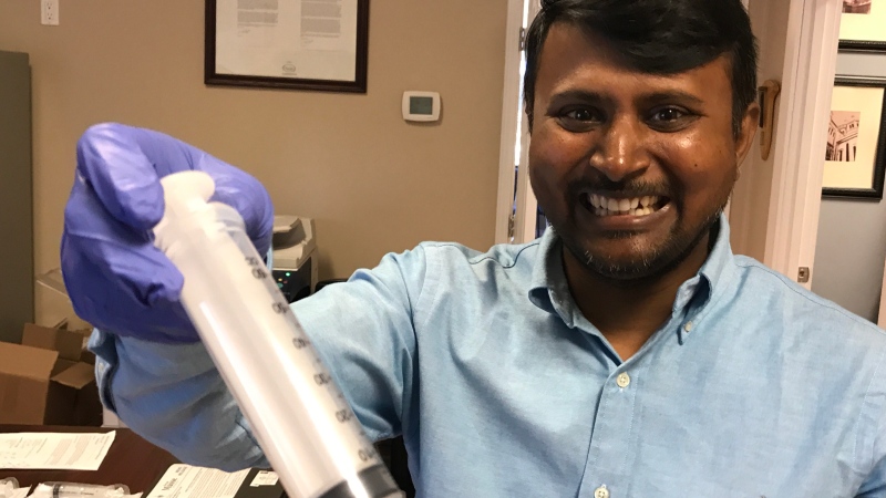 Dr. Subba Rao Chaganti poses with a water testing kit for a massive 'citizen science' experiment being hosted by the Great Lakes Institute for Environmental Research this Saturday. (Rich Garton / CTV Windsor)