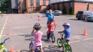 Kids learning bike safety in Pedalheads course.