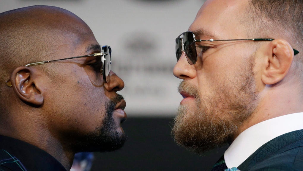 Floyd Mayweather Jr., left, and Conor McGregor