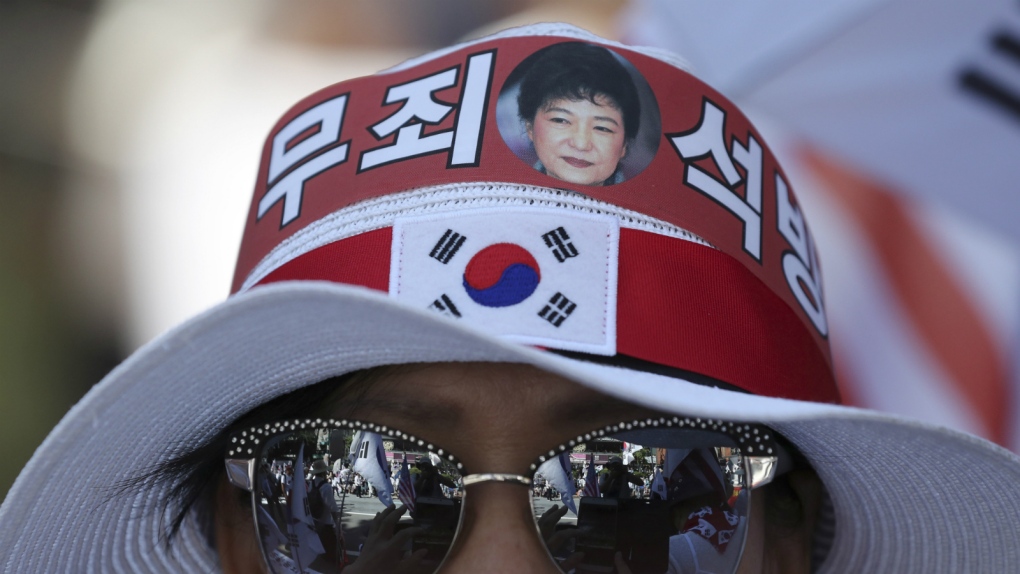 Protesters back former South Korean president
