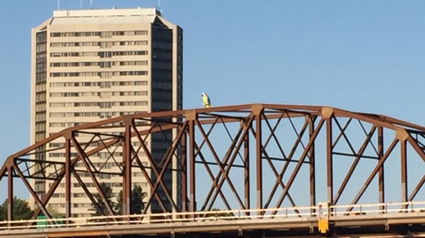 A parrot statue was stolen from Earls restaurant and placed on top of the Traffic Bridge over the weekend. (Mark Villani/CTV Saskatoon)