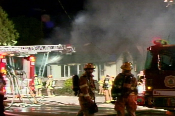 Firefighters battle the blaze in Markham, Ont. on Wednesday, June 20, 2007.