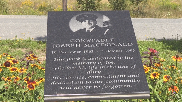 A look at a plaque displayed at Joe MacDonald Memorial Park.