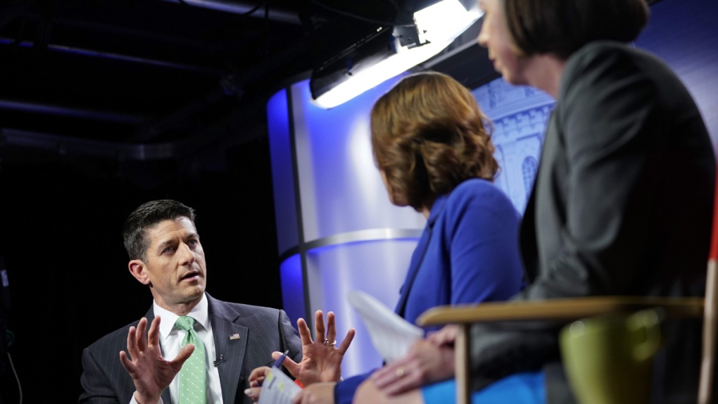 Paul Ryan with reporters Julie Pace, Erica Werner
