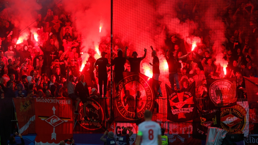 Spartak supporters light a flare 