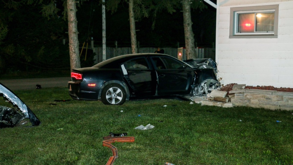 car hits house