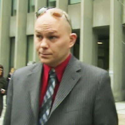 Jason Wallace, whose sick baby daughter was in the middle of an organ transplant debate, speaks to reporters outside a courtroom on April 22, 2009.