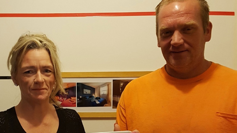 Suspects are described as Teresa Moorehouse (left) a 42-year-old woman who is 5'7 with blonde hair, and John Moorehouse (right), a 44-year-old white man who is 6'2 with light brown hair. Both speak with an Irish accent.