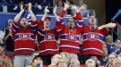 Fans of the Montreal Canadiens celebrate a goal by the team during the third period of its NHL hockey game against the Tampa Bay Lightning in Tampa, Fla., on Thursday, March 31, 2016. A new study suggests the excitement of watching one's favourite team can have a profound effect on the cardiovascular system by raising the heart rate. THE CANADIAN PRESS/AP-Mike Carlson