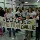 Family members of Master Cpl. Jared Baillie hold up a welcome home sign at CFB Petawawa, Thursday, April 23, 2009.