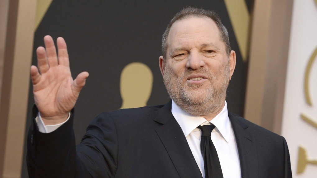 Harvey Weinstein arrives at the Oscars in 2014