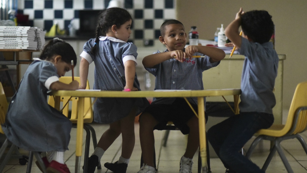 Children wait for schools after Hurricane Maria