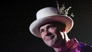 The Tragically Hip's Gord Downie performs during the first stop of the Man Machine Poem Tour at the Save-On-Foods Memorial Centre in Victoria, B.C., Friday, July 22, 2016. (THE CANADIAN PRESS/Chad Hipolito)