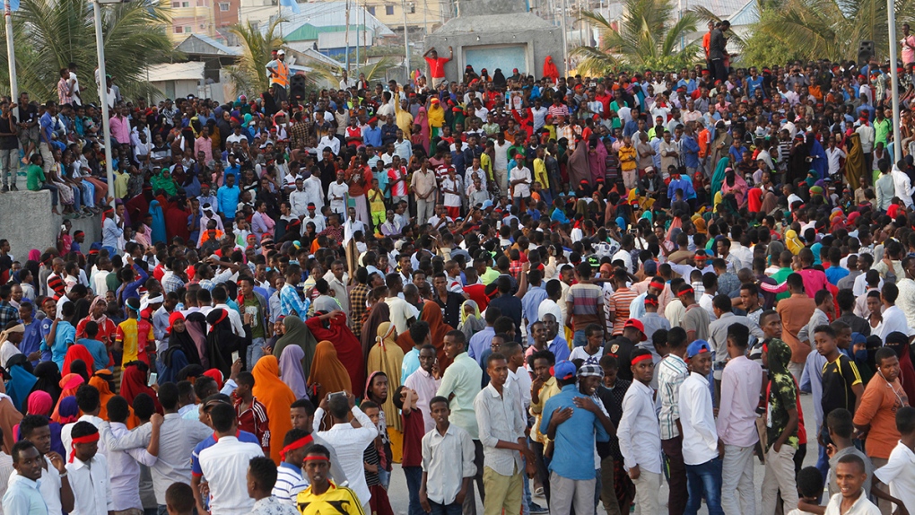 Protesters march at scene of Mogadishu bombing