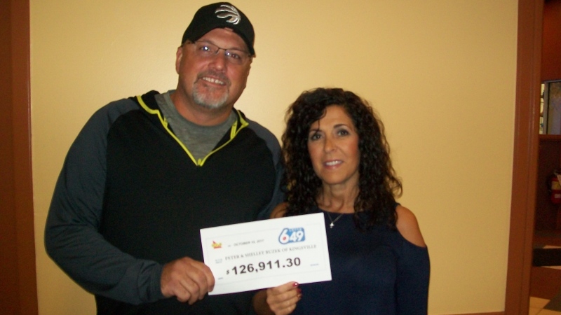 Peter and Shelley Buzek of Kingsville won $126,911 in the Aug. 30, 2017 Lotto 6/49 draw. (Courtesy OLG)