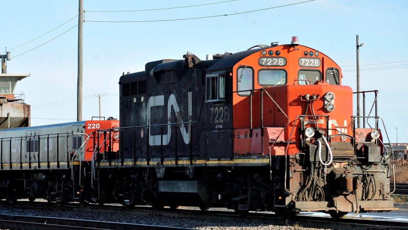 A CN locomotive goes through the CN Taschereau yard in Montreal. (File/THE CANADIAN PRESS)