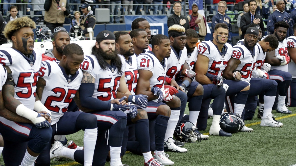 Houston Texans kneel during anthem