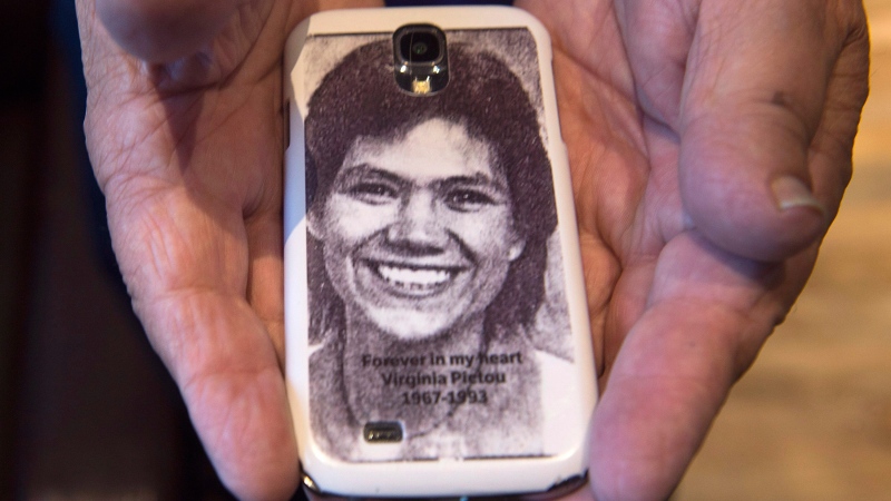 Robert Pictou, father of Virginia Pictou Noyes, displays a phone cover with a photo of his daughter as he attends the National Inquiry into Missing and Murdered Indigenous Women and Girls, in Membertou, N.S. on Tuesday, Oct. 31, 2017. (THE CANADIAN PRESS/Andrew Vaughan)