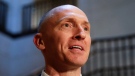 In this Nov. 2, 2017, photo, Carter Page, a foreign policy adviser to Donald Trump's 2016 presidential campaign, speaks with reporters following a day of questions from the House Intelligence Committee, on Capitol Hill in Washington. (AP Photo/J. Scott Applewhite)