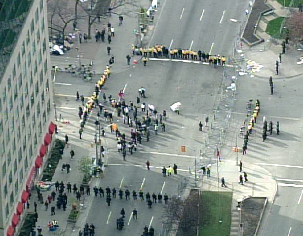 Aerial view from the CTV News helicopter over the scene as police move protesters off University Avenue and reopen the street to morning commuters, Thursday, April 30, 200.