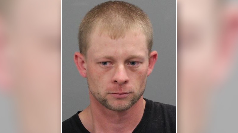 Jayson Cayer, wanted in connection with an alleged two-year-old pharmacy robbery in 2015, is described as white, 5'6" (168 cm), 150 lbs (68 kg), with blonde hair and blue eyes.
