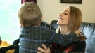 Stephanie Christiansen holds her 4-year-old son Hunter.