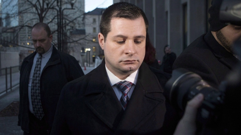 Toronto police officer Const. James Forcillo is shown leaving court in Toronto on Monday, Jan. 25, 2016. THE CANADIAN PRESS/Chris Young