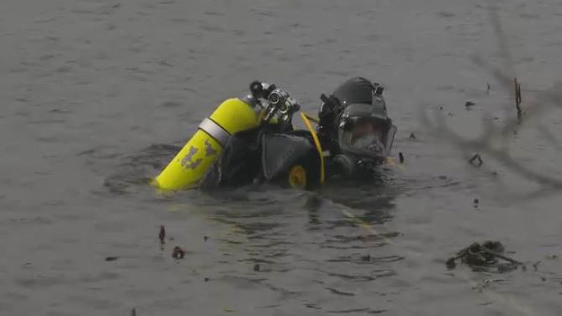 divers search Dartmouth pond