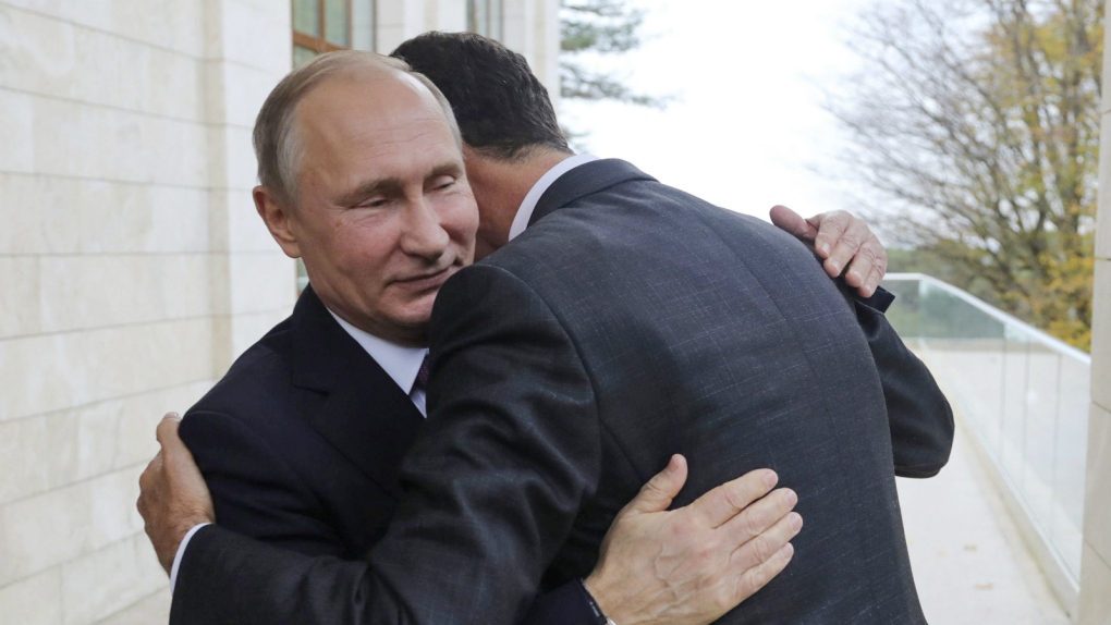 Bashar Assad meets with Vladimir Putin
