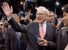 Warren Buffett, CEO of Berkshire Hathaway, right, waves to shareholders prior to the annual Berkshire Hathaway shareholders meeting in Omaha, Neb., on Saturday, May 2, 2009. (AP / Nati Harnik)