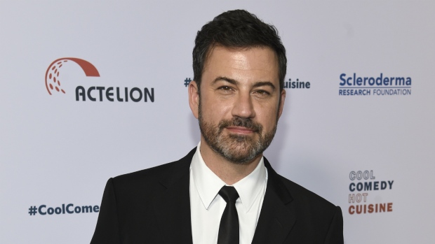 Late-night host Jimmy Kimmel holds son, pleads for health care | CTV News