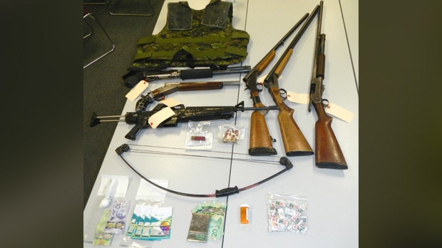 Weapons and drugs arrest in Portage