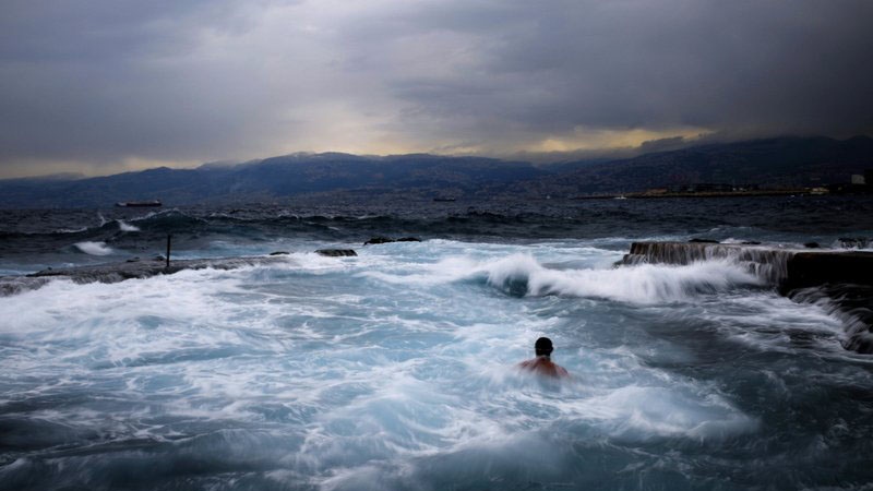 Men swimming in the Mediterranean sea 