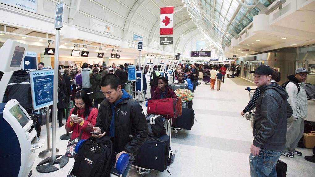 Passengers in line at Toronto's Pearson Airport