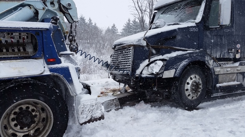 A truck is towed away after a crash on Highway 402 near Strathroy.
(Source: OPP)