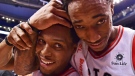Toronto Raptors' Kyle Lowry, left, and DeMar DeRozan celebrate after defeating the Milwaukee Bucks in NBA basketball action in Toronto on Monday, January 1, 2018. THE CANADIAN PRESS/Frank Gunn